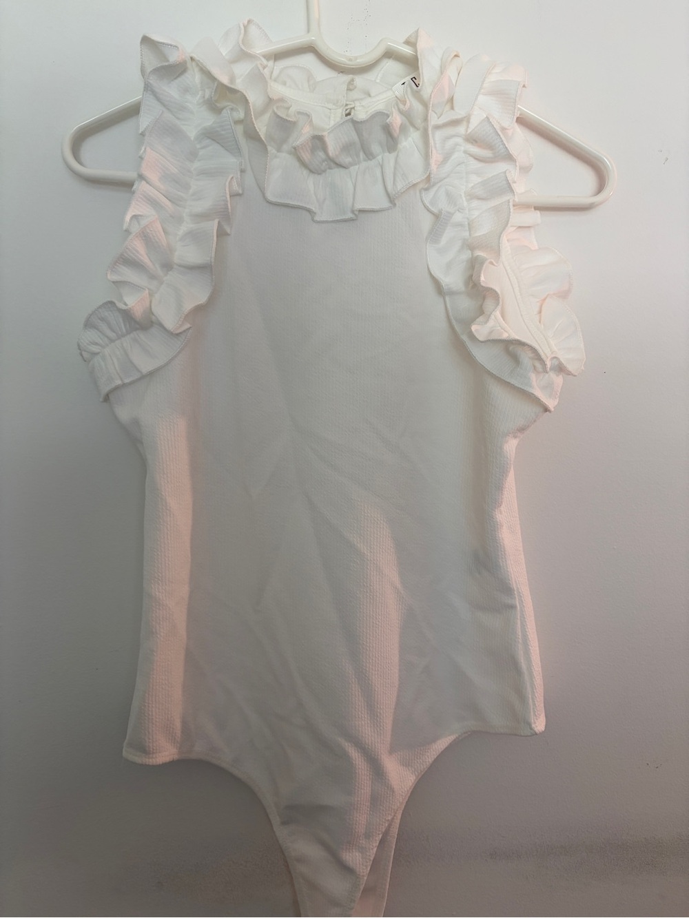 White Ruffle body suit